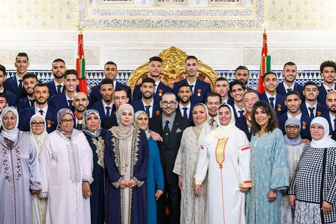 King Mohammed VI receives members of the Atlas Lions and their mothers at the Royal Palace following Morocco's 2022 World Cup campaign